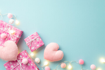 Valentine's Day concept. Top view photo of present boxes light bulb garland soft heart shaped toys...