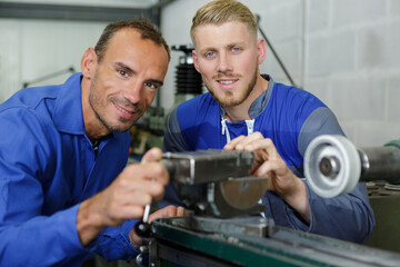 Obraz premium two machinists at work posing