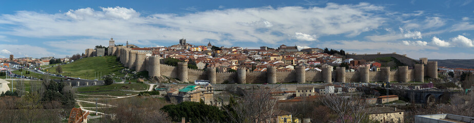 Fototapeta na wymiar Panoramic view of the historic city of Avila from the Mirador of Cuatro Postes, Spain, with its famous medieval town walls.