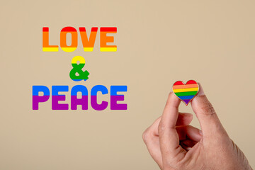 Love and peace concept. Text and colors of the LGBT flag