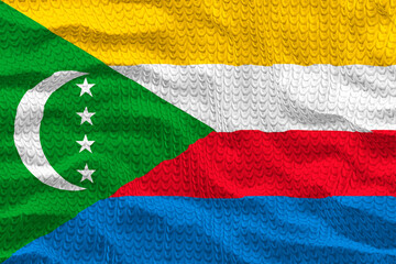 National flag of the Comoros. Background  with flag of the Comoros