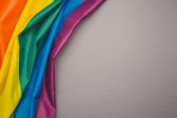 The rainbow flag or LGBTQ flag on a gray background
