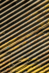 Metal shop shutters. Closed color shop shutter.
