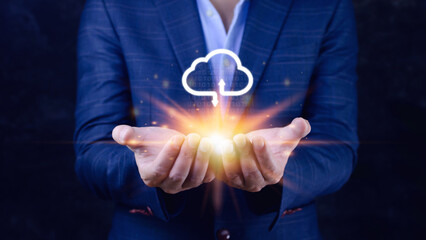 Businessman holding and giving virtual cloud icon computing with copy space to transfer data information and upload download application. technology transformation concept.Big data Concept