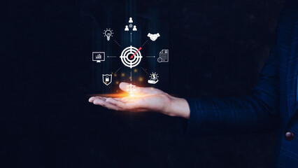 Hand shows the icon virtual screen of Digital target marketing advertising and sales increase business technology concept, online marketing, E-business, Ecommerce, Business online.