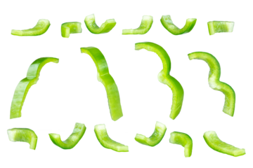 Set of fresh whole and sliced green bell pepper isolated on white background. With clipping path. Full depth of field. Focus stacking