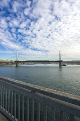 Long exposure. View of Haliç Metro Bridge connecting Azapkapı (Beyoğlu) and Unkapanı (Fatih) (Halic Metro Bridge). blue sky Istanbul Turkey