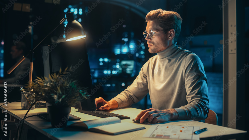 Poster office at night: manager working long hours alone in creative agency, implementing business strategy