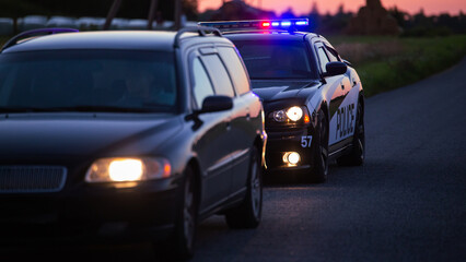 Highway Traffic Patrol Car Pulls over Vehicle Check on Empty Road. Police Officer Comes out of Car...