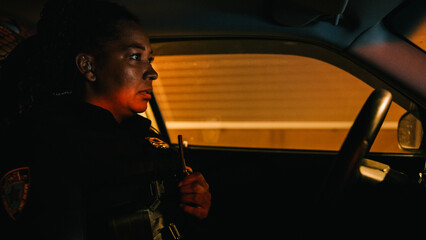 Inside Police Traffic Patrol Squad Car: Black Female Police Officer on Duty, Receives Emergency...