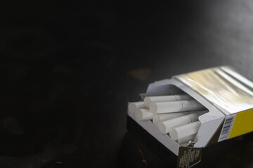 Close up of cigarette on the table. Stop smoking concept
