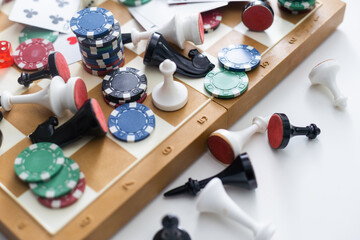 Gamepad, laying cards with the chips on the table.