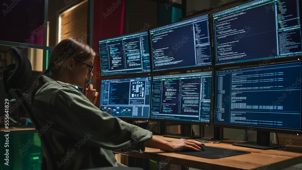 Poster Female Cyber Security Specialist Writing Code On Deskop Computer with Six Displays in Dark Office. Caucasian Woman Controlls Protection System, Monitoring Data, Debugging Software Errors.