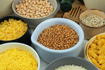 Buckwheat in bowl. Various vegetarian organic products. Vintage view.