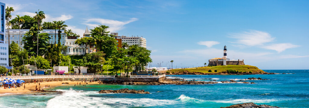 Panoramic view of the city of Salvador in Bahia on a sunny day with the Barra lighthouse, the beach and the city's buildings