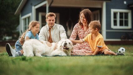 Portrait of a Happy Young Family Couple with a Son and Daughter, and a Noble White Golden Retriever...