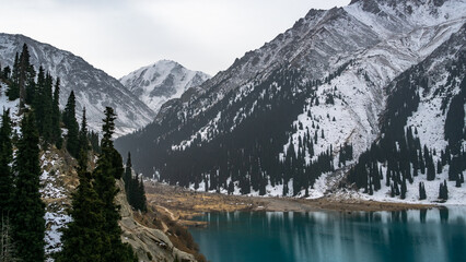 moraine lake in a mountain gorge. beautiful mountain lake. turquoise watercolor