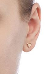 isolated on white background jewelry gold earrings stud with heart LOVE and shadow. On the arm and ears of a female model.