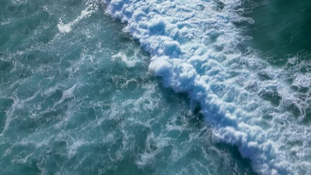 Aerial View Of Ocean Waves At Surfing Spot In Praia de Caion, Galicia, Spain.