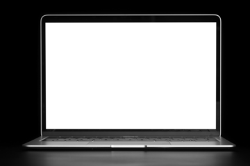 modern laptop computer on the table on the black background