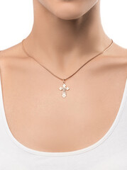 isolated on white background jewelry silver cross on a silver chain around the neck of a model girl. Front and side view of jewelry on girl