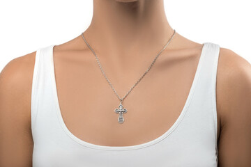 isolated on white background jewelry silver cross on a silver chain around the neck of a model girl. Front and side view of jewelry on girl