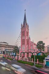 Fototapeta premium Beautiful evening at Tan Dinh parish church or Church of the Sacred Heart of Jesus is a church located in Ho Chi Minh City. Selective focus. Travel concept