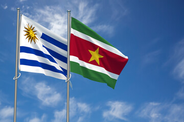 Oriental Republic of Uruguay and Republic of Suriname Flags Over Blue Sky Background. 3D Illustration