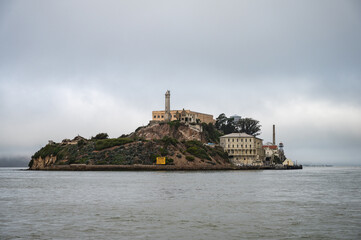 Landscape of Alcatraz prison island "the rock" in a foggy day