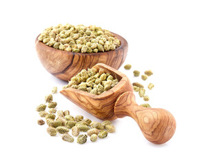 Thyme spice in wooden spoon isolated on white background. Oregano ball. Thymus vulgaris.