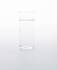 A glass of water on white background
