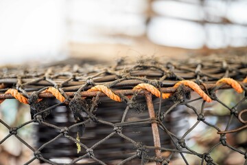 crayfish pot and lobster pots on the back of a fishing boat - Powered by Adobe