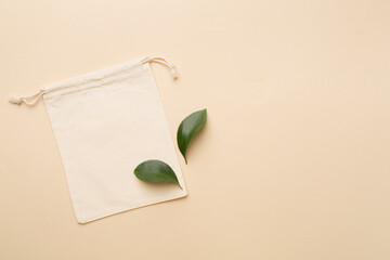 Small eco sack on color background. Top view.