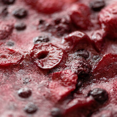 Berries in mousse close-up. Berry dessert filling. Vegetarian dessert. 