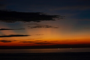 Fototapeta na wymiar Seascape shot of the beautiful evening sunset cloudy sky at Andaman Sea. 