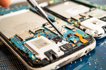 Repairing and upgrade mobile phone, electronic, computer hardware and technology concept.