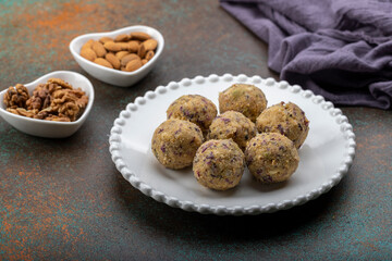 Dry fruit ladoo is a healthy ladoo prepared with only dry fruits without any sugar or jaggery, consumed in winter in India.