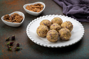 Dry fruit ladoo is a healthy ladoo prepared with only dry fruits without any sugar or jaggery, consumed in winter in India.
