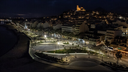 Aerial view of the new modern design park and the promenade of Altea (Alicante, Spain) and the downtown and its famous church in the background