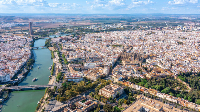 Aerial view of the Spanish city of Seville in the Andalusia region on the river Guadaquivir overlooking the cathedral - Powered by Adobe