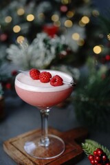 Clover club cocktail on festive holiday background, selective focus