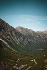 Valley in Norway surrounded by mountains on a autumn day.
