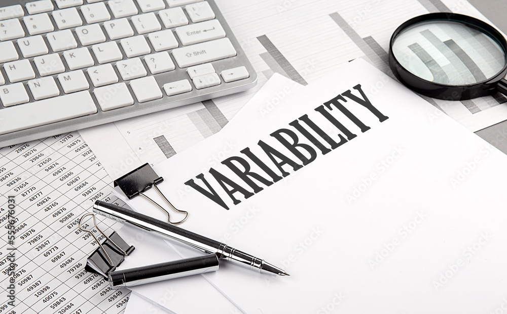 Poster variability text on paper with chart and keyboard, business concept