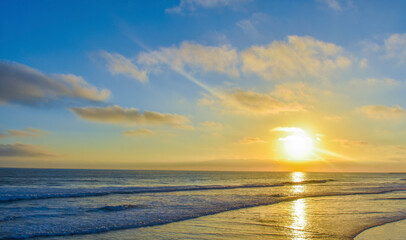 Fototapeta na wymiar California Sunset Over the Ocean Background