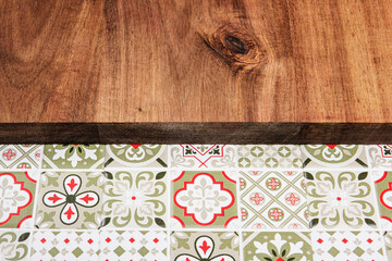 wooden table on green patterned tile background
