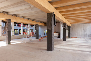 Fototapeta construction site of a Timber-concrete composite office building obraz