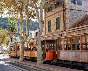 Port de Soller, Mallorca, Spain - 11 Nov 2022: Ferrocarril Tram train in the tourist town of Soller