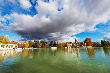 Madrid, the Buen Retiro Park (Parque del Buen Retiro) and the Monument to Alfonso XII (King of Spain) with the small lake and the public park.Community of Madrid, Spain, southern Europe.