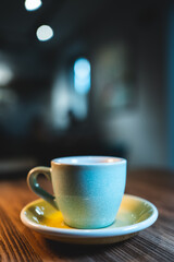 fresh tasty cup of espresso or americano coffee on the table in cafe