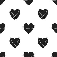 Pattern with hearts in barbed wire. Pattern for Valentine's Day. Vector silhouette of heart. Card for Valentine's Day.
